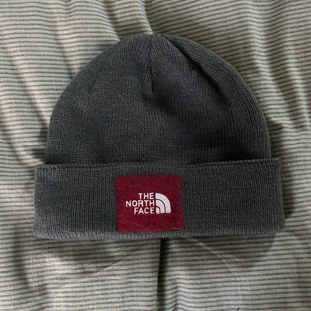 North Face Beanie in Grey color with red felt Logo design
